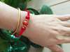 Picture of Red Agate Rope Braided Eight Guardian Zodiac Natal Buddha/Bodhisattva Amulet Bracelet